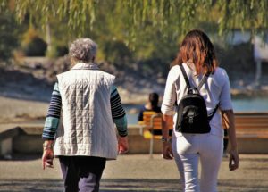 Mother and Adult Daughter Walking and Talking