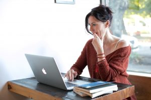 Woman looking at computer